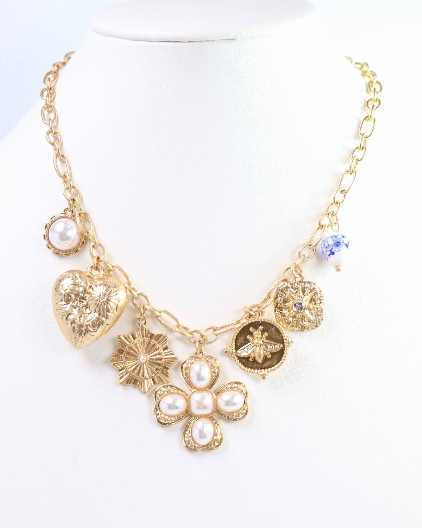Verona Gold and Pearl Charm Necklace Worn Gold