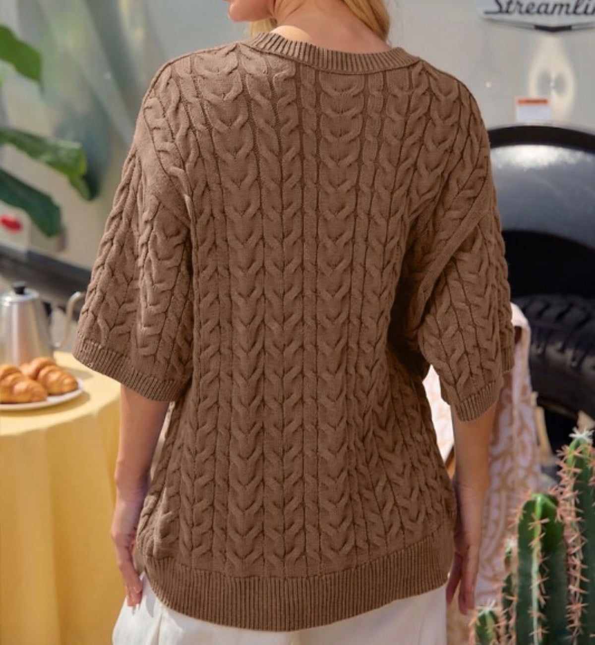 Back view of taupe cable-knit short-sleeve sweater top