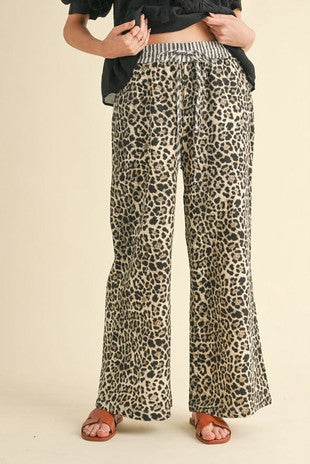 Leopard print wide-leg pants with smocked elastic waistband
