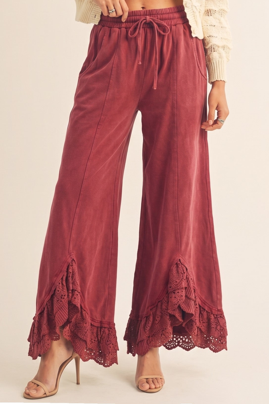 Burgundy mineral-wash wide-leg pants with lace-trimmed hems
