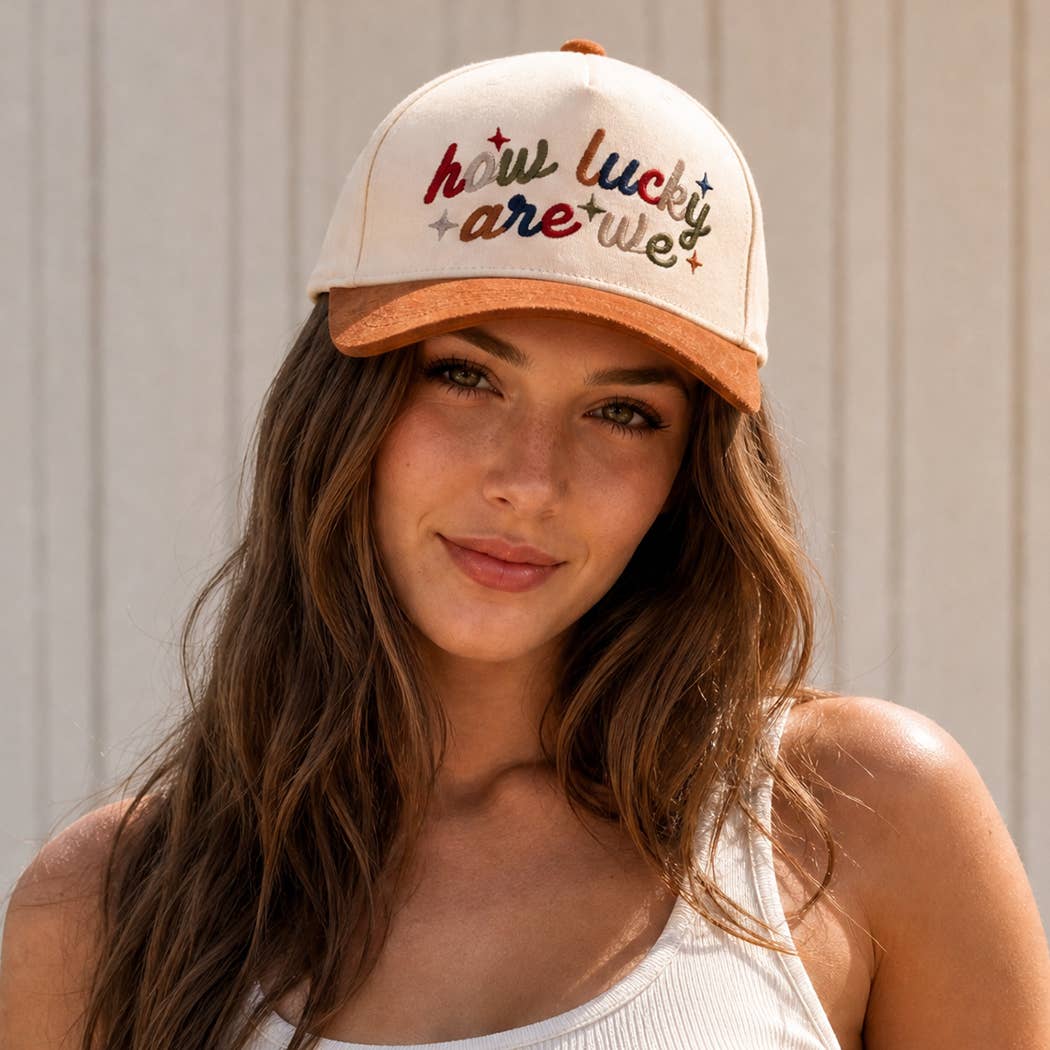 HOW LUCKY ARE WE Embroidered Two-Tone Suede Brim Trucker Hat