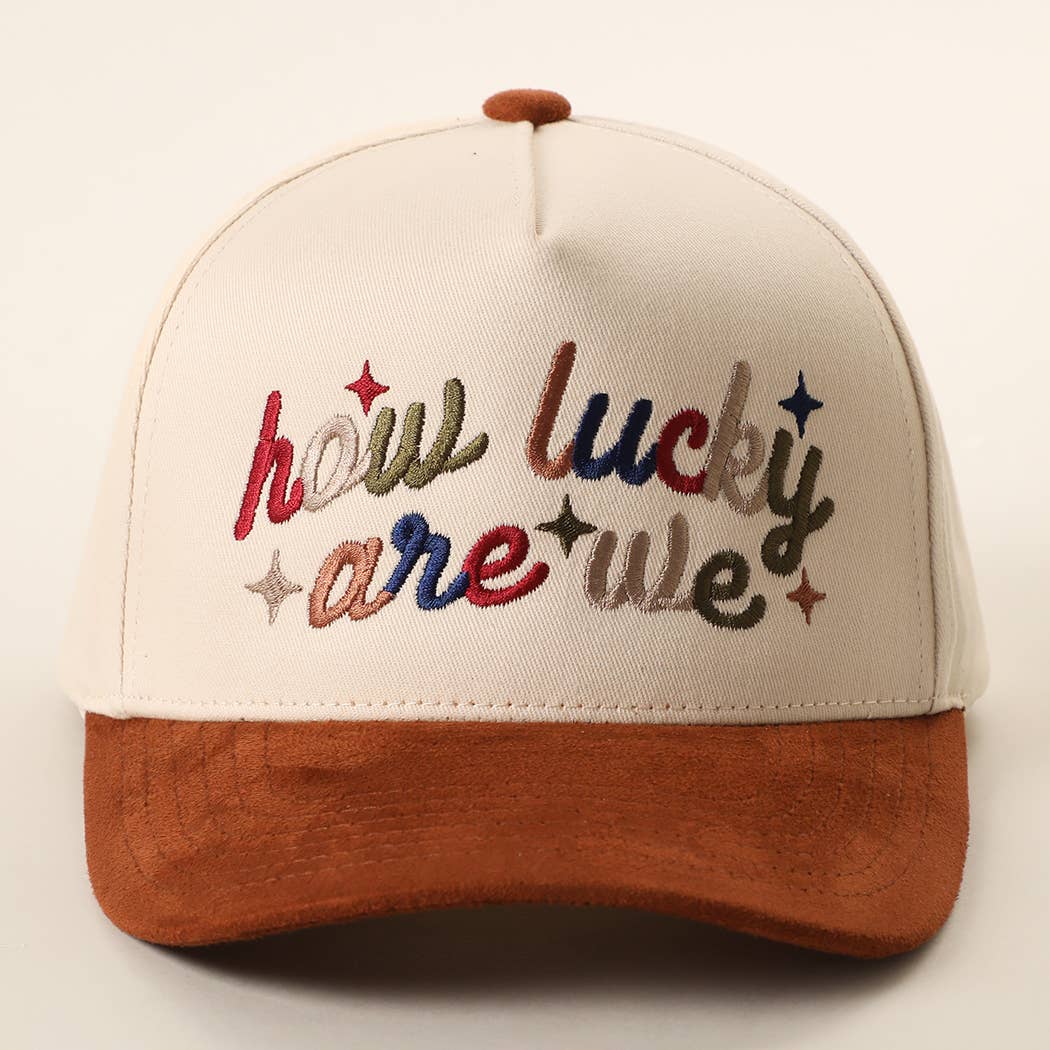 HOW LUCKY ARE WE Embroidered Two-Tone Suede Brim Trucker Hat