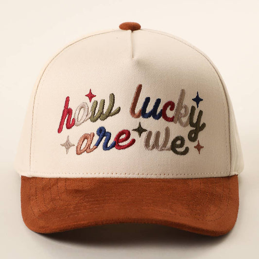 HOW LUCKY ARE WE Embroidered Two-Tone Suede Brim Trucker Hat