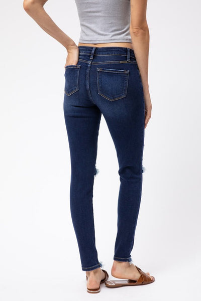 Distressed Mid-Rise Super Skinny Jeans